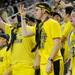 Michigan fans cheer after a three-point basket in the first quarter against Northwestern at Crisler Center on Wedensday. Melanie Maxwell I AnnArbor.com